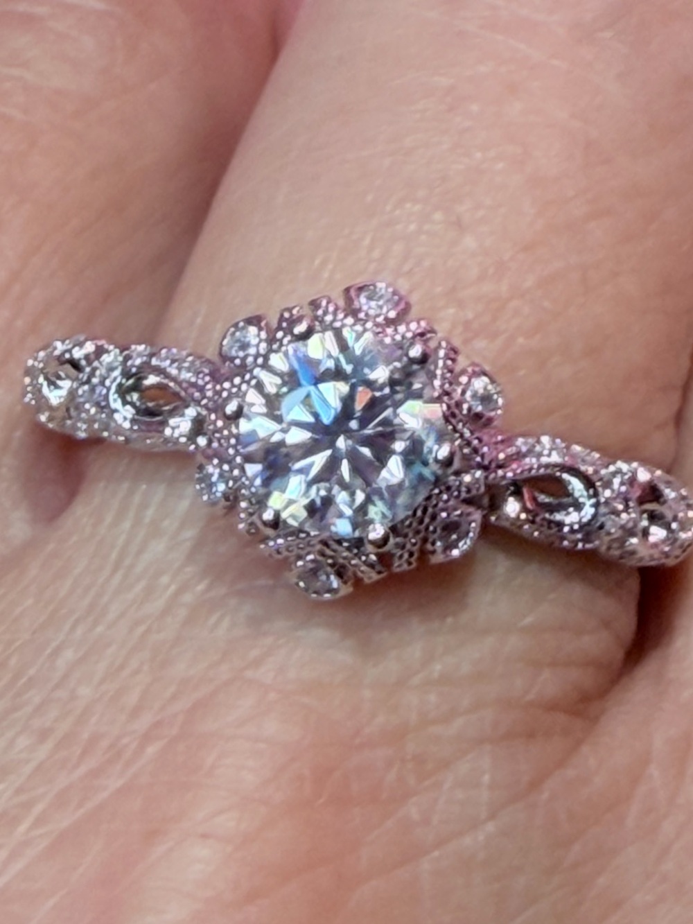 New Unique Solitaire Round-Cut Moissanite Ring in a prong setting detailed band